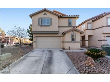 Charming two-story home featuring a two-car garage and low-maintenance landscaping at 6527 Belgrave Hall Ln, Las Vegas, NV 89122