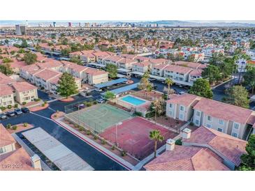 Enjoy community living with a pool and sports court in this complex, with Las Vegas skyline views at 7300 Pirates Cove Rd # 2093, Las Vegas, NV 89145