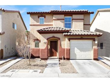 Charming two-story home with a well-maintained yard and attached garage at 1203 Sweet Orange St, Las Vegas, NV 89142