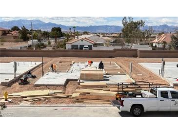 Active construction site shows foundation and framing work in progress on a new home at 9189 Oakdale Ranch Ct, Las Vegas, NV 89139