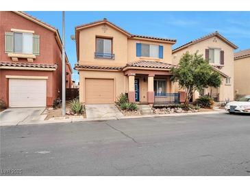 Charming two-story home with a well-manicured front yard and inviting front porch at 6891 Nickel Mine Ave, Las Vegas, NV 89122