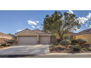 Charming single-story home with well-maintained landscaping and a spacious three-car garage at 6429 White Tiger Ct, Las Vegas, NV 89130