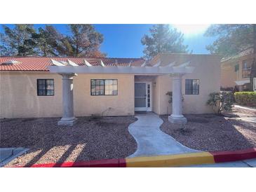 Charming single story home with cozy entry, tiled roof, and mature landscaping at 2851 S Valley View Blvd # 1153, Las Vegas, NV 89102