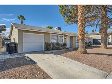 Charming one-story home featuring a driveway, single car garage, and desert landscaping at 4495 Park View Dr, Las Vegas, NV 89104