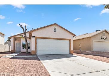 Charming single-story home with low-maintenance landscaping and a two-car garage at , Las Vegas, NV 89108