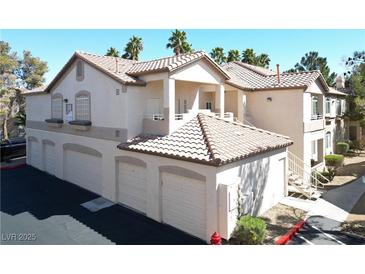 Inviting condo with tile roof and attached three-car garage in a desirable location at 75 N Valle Verde Dr # 1822, Henderson, NV 89074