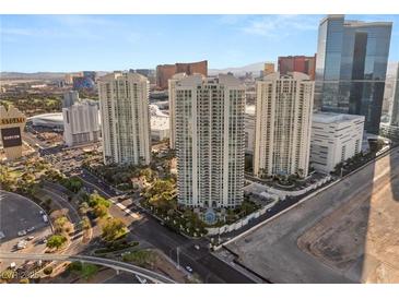 Stunning aerial view showcasing three modern high-rise buildings with city and mountain views at 2777 Paradise Rd # 1208, Las Vegas, NV 89109