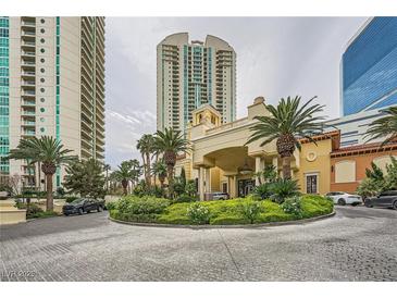 Stunning building exterior featuring a grand entrance with palm trees and manicured landscaping at 2857 Paradise Rd # 2704, Las Vegas, NV 89109