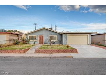 Charming single-story home with a well-maintained front yard and attached garage at 4102 Calimesa St, Las Vegas, NV 89115