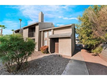 Inviting two-story home with a private front entrance and desert landscaping at 539 Sellers Pl, Henderson, NV 89011
