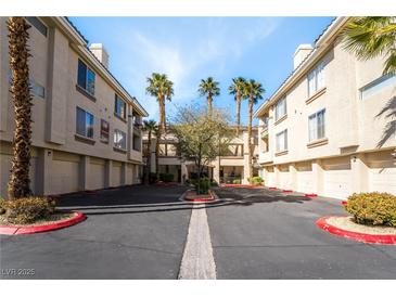 Charming condo complex with mature landscaping and ample parking at 7163 S Durango Dr # 303, Las Vegas, NV 89113