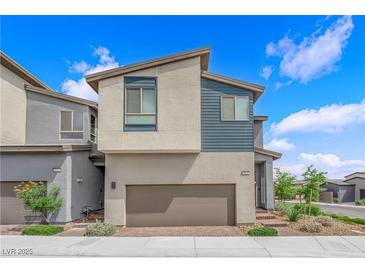 Charming two-story home featuring a modern design and a neatly landscaped front yard at 3192 Timorasso Ave, Henderson, NV 89044