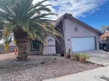 Charming single-Gathering home featuring desert landscaping and a two-car garage at 637 Del Prado Dr, Boulder City, NV 89005
