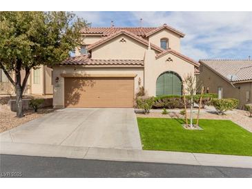 Charming home featuring a well-maintained yard and a two-car garage at 11237 Gallery Echo St, Las Vegas, NV 89141