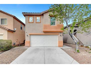 Charming two-story home with a two-car garage and well-maintained landscaping at 5044 Whistling Acres Ave, Las Vegas, NV 89131