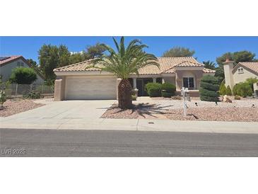 Charming single-story home featuring desert landscaping and a spacious two-car garage at 3117 Brightridge Dr, Las Vegas, NV 89134