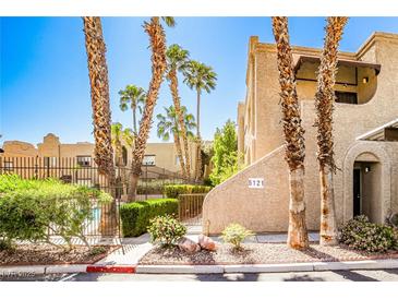 Exterior view of home featuring desert landscaping and palm trees at 5121 Pioneer Ave # 204, Las Vegas, NV 89146