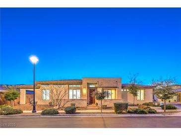 Beautiful single-story home with stone accents, manicured landscaping, and inviting curb appeal at 4273 Sunrise Flats St, Las Vegas, NV 89135