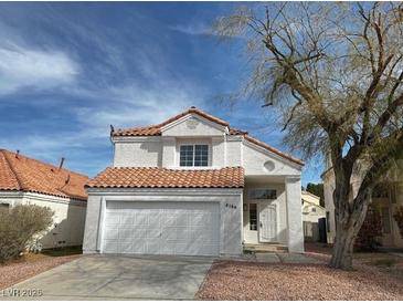 Charming two-story home with a well-maintained front yard and a two-car garage at 8166 Tone St, Las Vegas, NV 89123