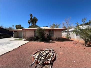 Charming single-story home featuring a red rock yard and cozy exterior at 1132 S 10Th St, Las Vegas, NV 89104