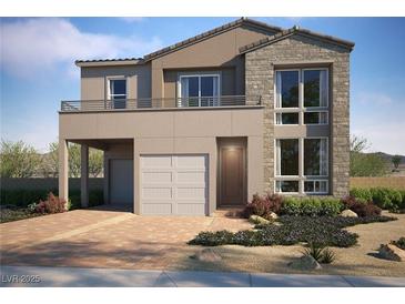 Charming two-story home featuring a stone facade, a balcony, two garages, and a well-manicured front yard at 1785 Flycatch St, Las Vegas, NV 89138