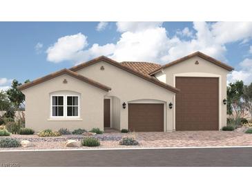 Charming single-story home featuring a tile roof, neutral stucco exterior, and a two-car garage at 4340 S Angel Falls Ct, Pahrump, NV 89061