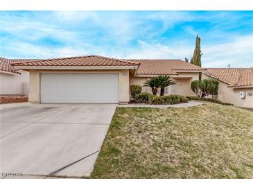 Charming single-story home featuring a two-car garage and well-maintained desert landscaping at 178 Beach Oak Ave, Henderson, NV 89002