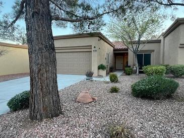 Charming single-story home with desert landscaping and a two-car garage at 9449 Grand Mesa Dr, Las Vegas, NV 89134