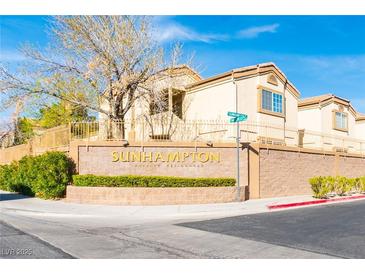 Sunhampton Private Residences neighborhood street view shows landscaping and clear skies at 7061 Roscoe Ave # 201, Las Vegas, NV 89129