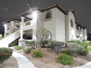 Inviting multi-story condo with a well-maintained yard and charming desert landscaping at 1403 Santa Margarita St # D, Las Vegas, NV 89146