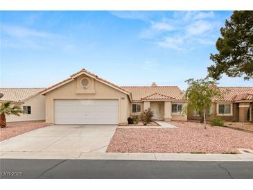Charming single-story home featuring a two-car garage, neutral paint, and well-maintained landscaping at 6209 Lenaking Ave, Las Vegas, NV 89122