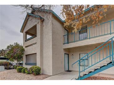 Two story home with well maintained landscaping and stairs to balcony at 5161 Lindell Rd # 201, Las Vegas, NV 89118
