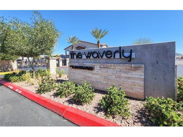 Attractive community sign reads, 'The Waverly' with beautiful landscaping at 965 Nevada State Dr # 36102, Henderson, NV 89002