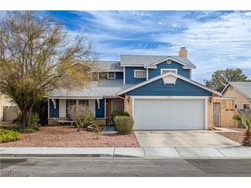 Charming two-story home with a well-maintained front yard and a two car garage at 4322 Satinwood Dr, Las Vegas, NV 89147