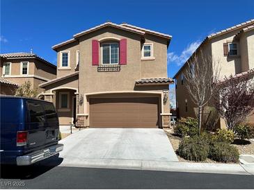Inviting two-story home featuring a brown garage door and colorful red window shutters at 486 Stonegate Meadow Ave, Las Vegas, NV 89178