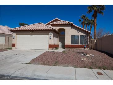Charming single-story home featuring a two-car garage and low-maintenance landscaping at 5200 Brookmere Dr, Las Vegas, NV 89130