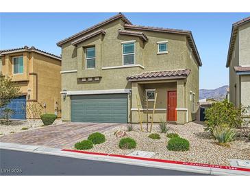 Charming two-story home featuring a two-car garage and drought-tolerant landscaping in a desirable neighborhood at 4454 Lantern Point Ave, North Las Vegas, NV 89084