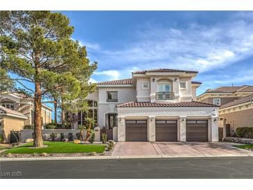 Stunning two-story home featuring a well-manicured lawn, mature trees, and a three-car garage, under a sunny blue sky at 1912 Glenview Dr, Las Vegas, NV 89134