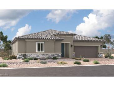 Charming single-story home showcasing stone accents, neutral stucco, tile roof, and a well-manicured desert landscape at 5699 E Victoria Falls Dr, Pahrump, NV 89061