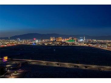 Wonderful twilight view overlooking the Las Vegas strip, showing its many lights and landmarks at 8255 S Las Vegas Blvd # 1907, Las Vegas, NV 89123