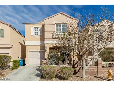 Two-story home with desert landscaping, two car garage, and neutral color palette at 6382 Lonesome Lake St, Las Vegas, NV 89148