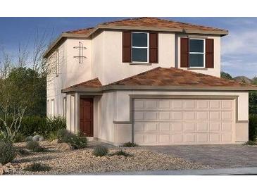 Charming two-story home with a two-car garage and a mix of desert landscaping with native trees and shrubs at 6616 Tumoulin St, Las Vegas, NV 89148