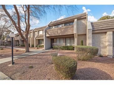 Charming townhome with a well-manicured front yard and desert landscaping at 3365 Zephyr Ct, Las Vegas, NV 89121