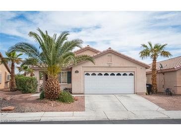 Charming single-story home with desert landscaping and a two-car garage at 5014 Sail Rock Pl, North Las Vegas, NV 89031