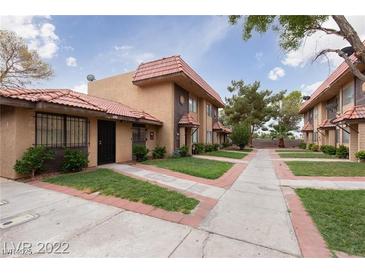 Charming townhouses feature well-kept lawns and classic red tile roofs at 4315 Lynnann Dr, Las Vegas, NV 89110