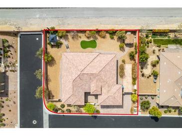 An aerial view of a single Gathering home featuring a landscaped backyard with a gazebo and artificial turf at 9731 Addie Meadow Ct, Las Vegas, NV 89149