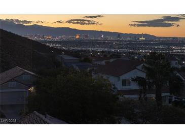 Beautiful city view at twilight from a home in a residential neighborhood at 378 Rosefinch St, Henderson, NV 89012