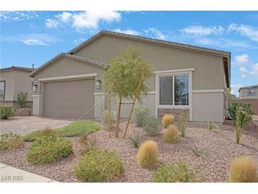 Charming single-story home featuring a low maintenance desert landscaped front yard at 333 Aravalli Crest St, Henderson, NV 89015