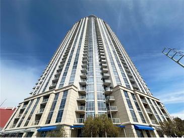Modern high-rise building featuring sleek architecture and multiple balconies against a clear blue sky at 200 W Sahara Ave # 3909, Las Vegas, NV 89102