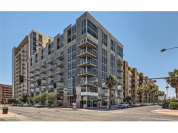 Contemporary condo building featuring expansive windows and inviting balconies in a vibrant urban setting at 353 E Bonneville Ave # 439, Las Vegas, NV 89101